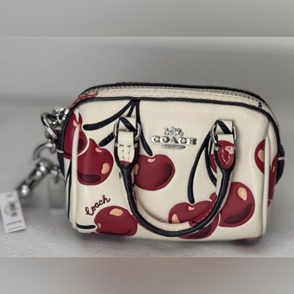 Coach Handbags - NWT Coach CZ082 Mini Rowan Bag Charm With Cherry Print In Chalk Leather Keychain